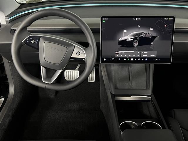 Photo of 2024 Solid Black Tesla Model 3