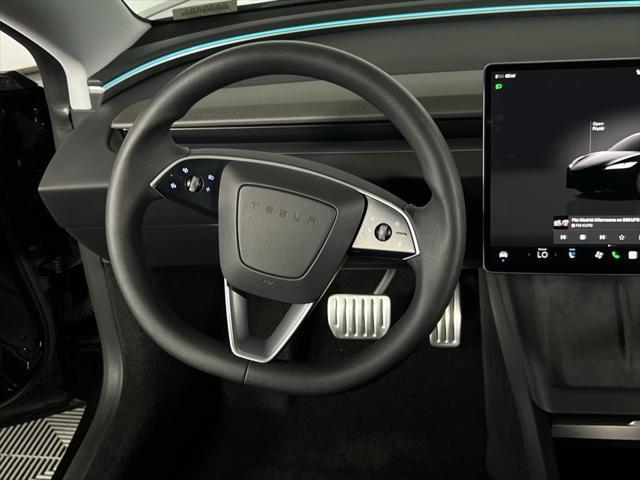 Photo of 2024 Solid Black Tesla Model 3