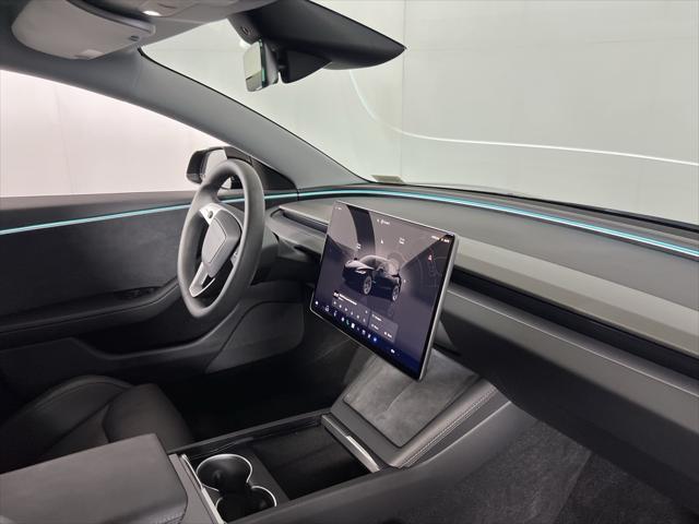 Photo of 2024 Solid Black Tesla Model 3