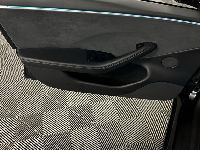 Photo of 2024 Solid Black Tesla Model 3