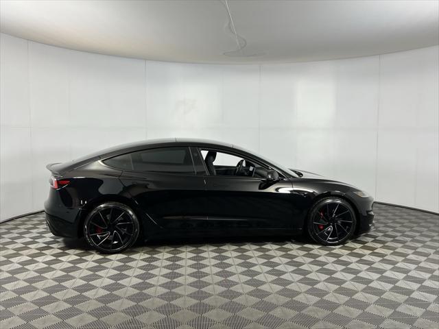 Photo of 2024 Solid Black Tesla Model 3