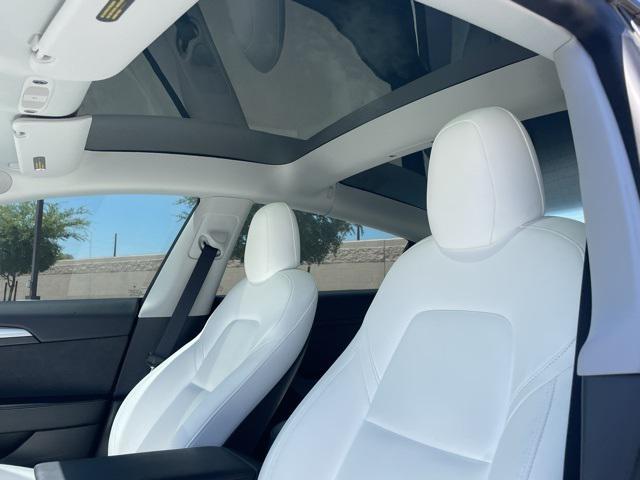 Photo of 2021 Pearl White Multi-Coat Tesla Model 3