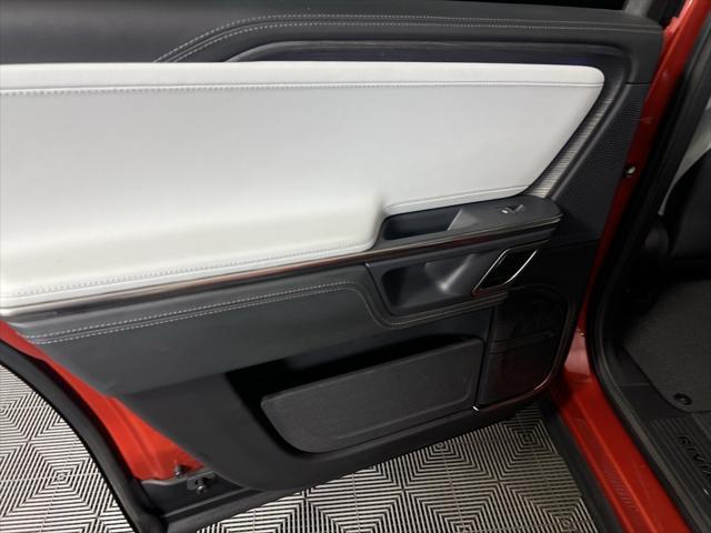 Photo of 2024 Orange Rivian R1S