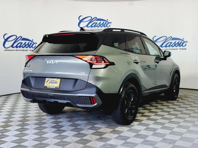 Photo of 2023 Jungle Green/Ebony Black Roof Kia Sportage