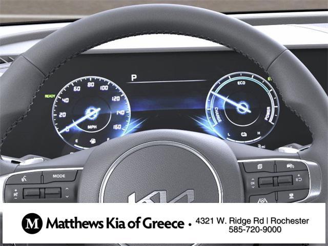 Photo of 2025 White Pearl Kia Sportage Hybrid