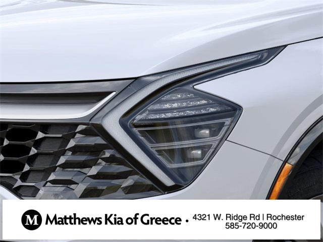 Photo of 2025 White Pearl Kia Sportage Hybrid