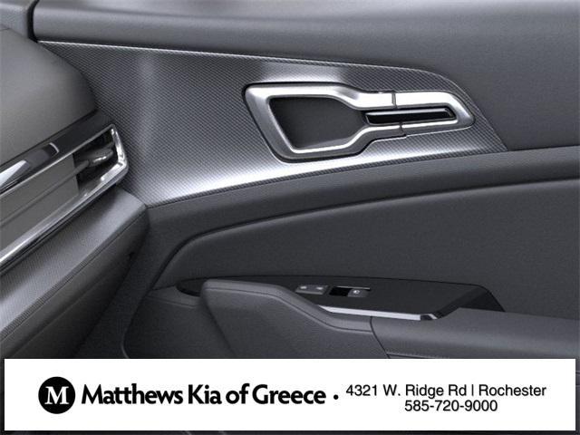Photo of 2025 White Pearl Kia Sportage Hybrid