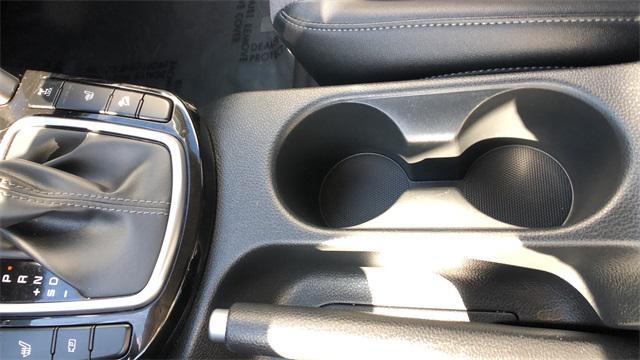 Photo of 2025 Clear White/Black Roof Kia Seltos