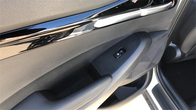 Photo of 2025 Clear White/Black Roof Kia Seltos