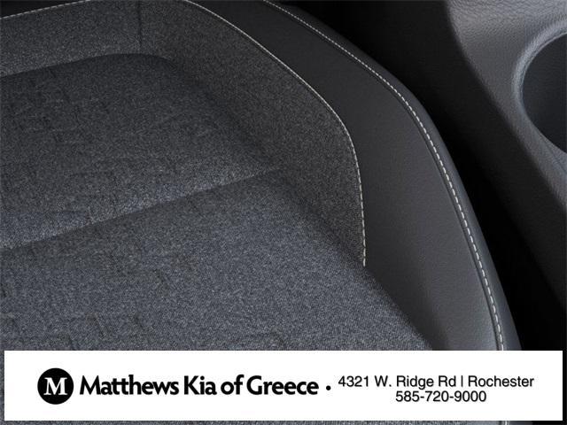 Photo of 2025 Clear White/Black Roof Kia Seltos