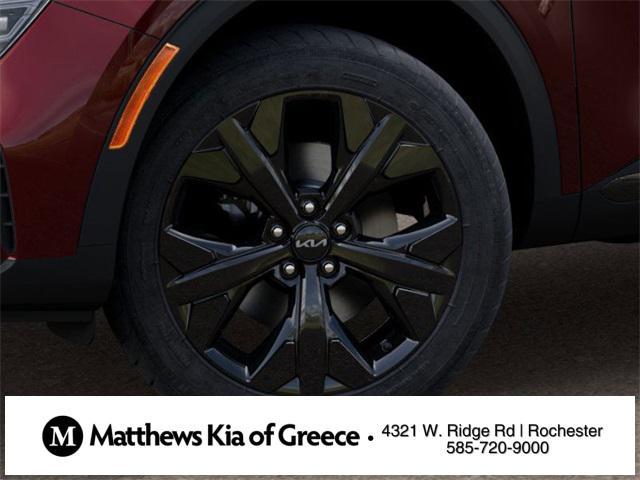 Photo of 2025 Dawning Red Kia Sportage