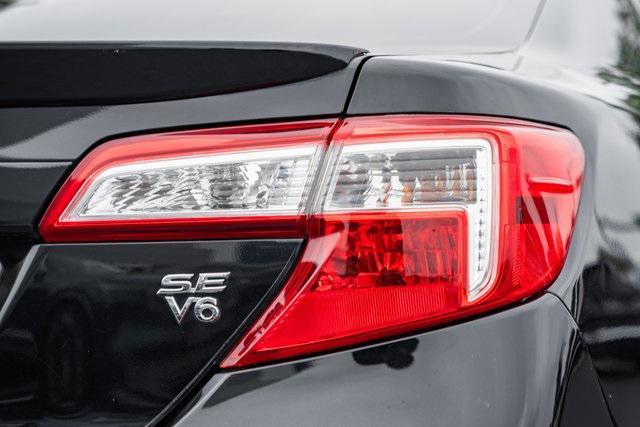 Photo of 2014 Attitude Black Metallic Toyota Camry