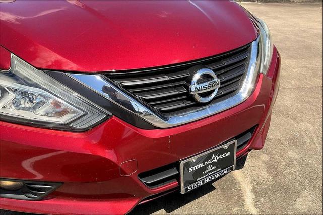 Photo of 2017 Cayenne Red Nissan Altima
