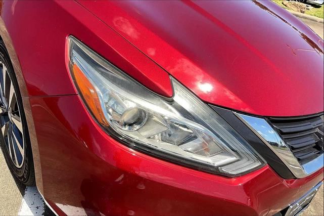 Photo of 2017 Cayenne Red Nissan Altima