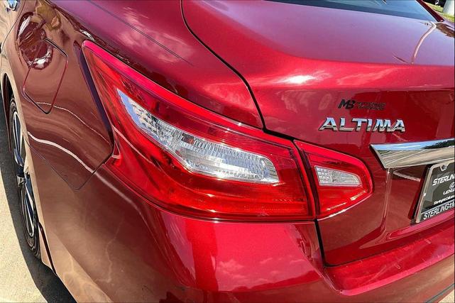 Photo of 2017 Cayenne Red Nissan Altima