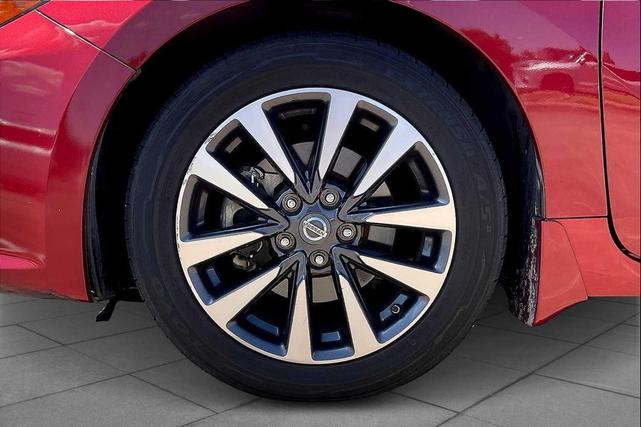 Photo of 2017 Cayenne Red Nissan Altima