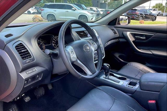 Photo of 2017 Cayenne Red Nissan Altima