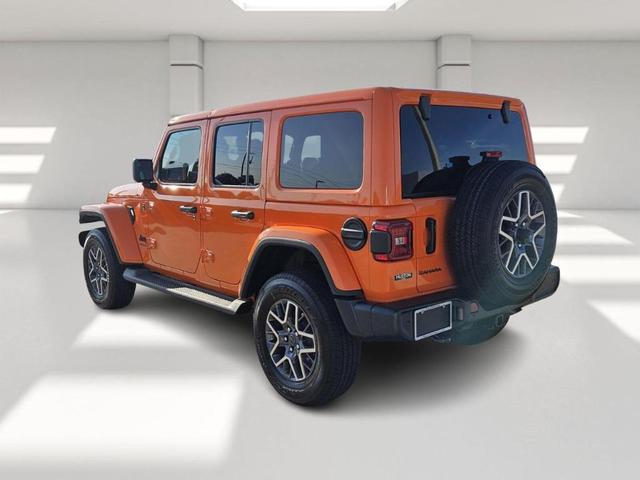 Photo of 2025 Orange Jeep Wrangler