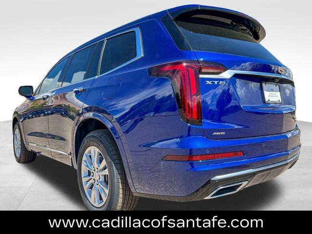 Photo of 2025 Opulent Blue Metallic Cadillac XT6