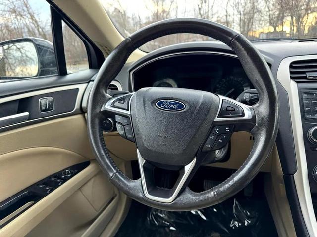 Photo of 2015 Tuxedo Black Ford Fusion