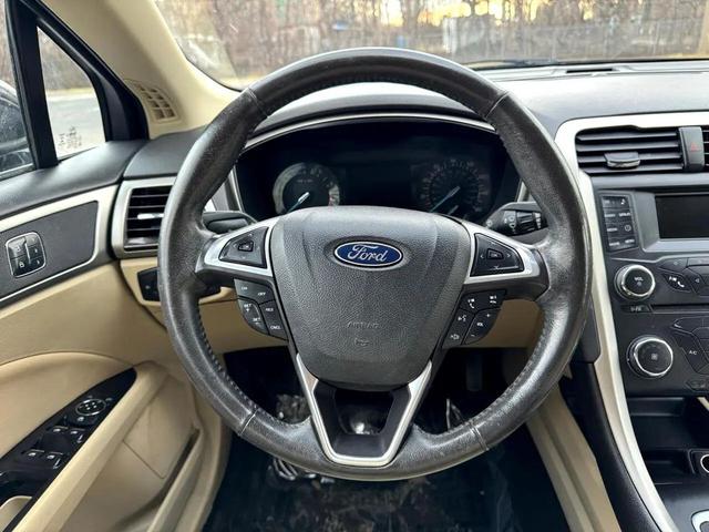 Photo of 2015 Tuxedo Black Ford Fusion
