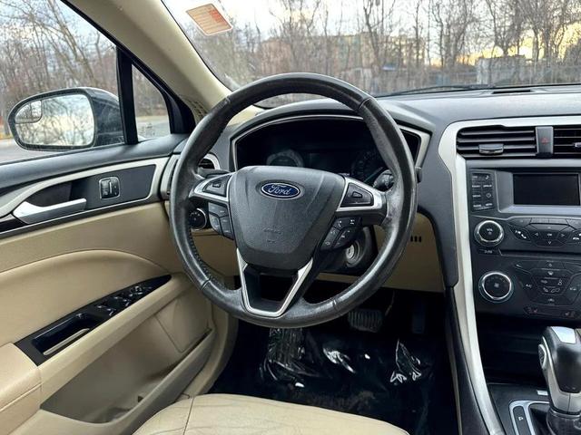 Photo of 2015 Tuxedo Black Ford Fusion
