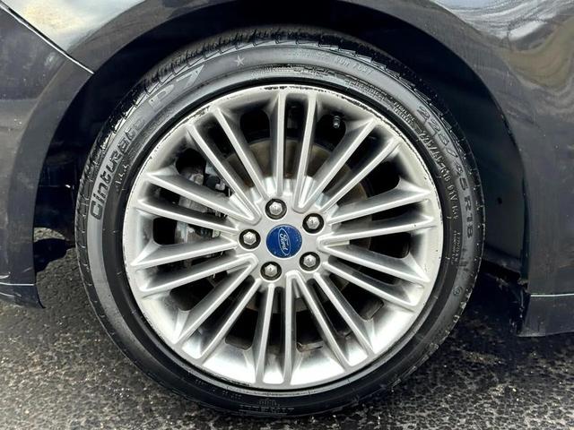 Photo of 2015 Tuxedo Black Ford Fusion