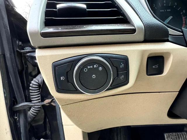 Photo of 2015 Tuxedo Black Ford Fusion