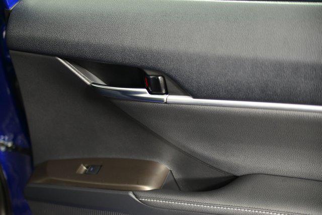 Photo of 2023 Reservoir Blue Toyota Camry Hybrid