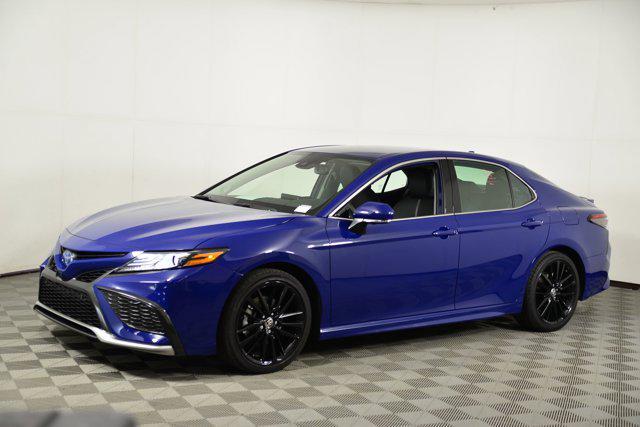 Photo of 2023 Reservoir Blue Toyota Camry Hybrid