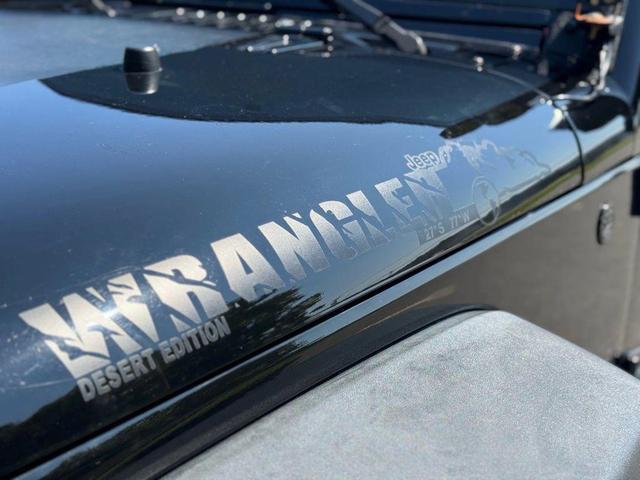 Photo of 2016 Black Clearcoat Jeep Wrangler Unlimited