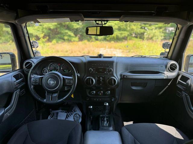 Photo of 2016 Black Clearcoat Jeep Wrangler Unlimited