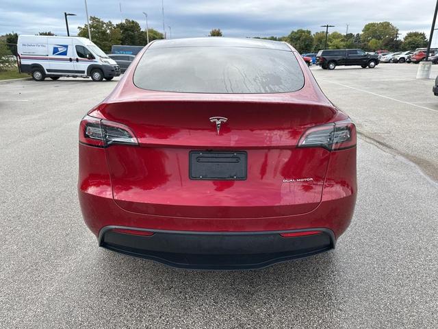 Photo of 2025 Ultra Red Tesla Model Y