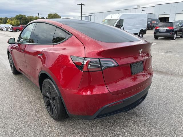 Photo of 2025 Ultra Red Tesla Model Y