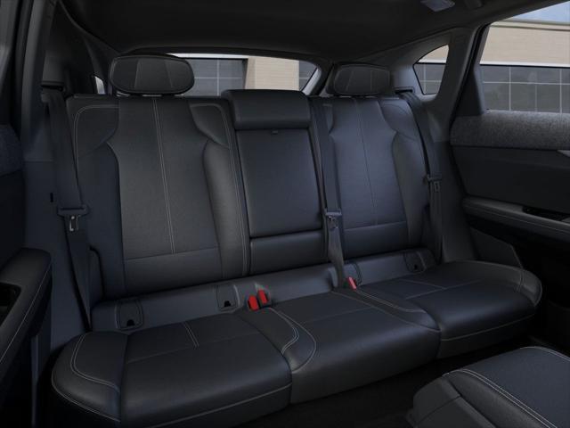 Photo of 2025 Orange Cadillac OPTIQ