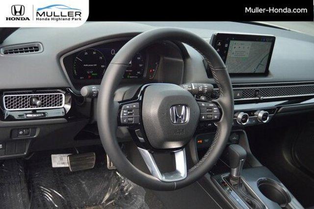 Photo of 2026 Platinum White Pearl Honda Civic Hybrid