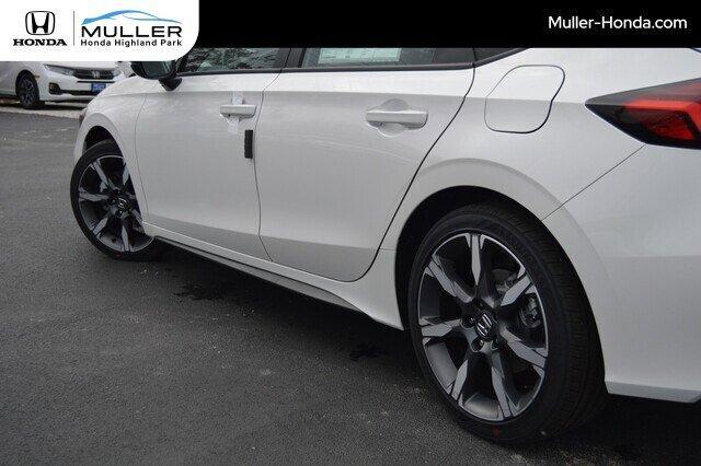 Photo of 2026 Platinum White Pearl Honda Civic Hybrid
