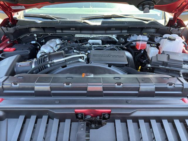 Photo of 2025 Volcanic Red Tintcoat GMC Sierra 2500