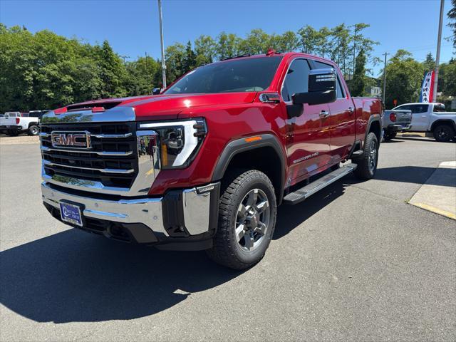 Photo of 2025 Volcanic Red Tintcoat GMC Sierra 2500