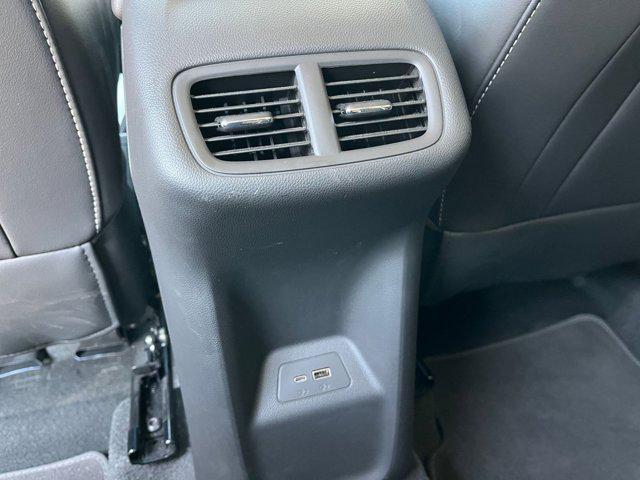 Photo of 2024 Ebony Twilight Metallic Buick Envision
