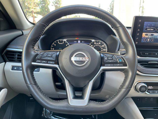 Photo of 2024 Pearl White Tricoat Nissan Altima