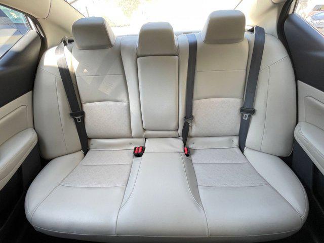 Photo of 2024 Pearl White Tricoat Nissan Altima