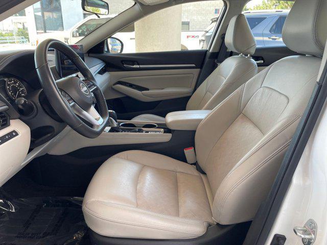 Photo of 2024 Pearl White Tricoat Nissan Altima