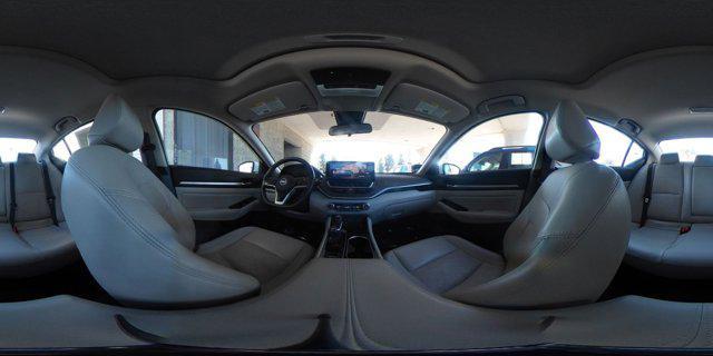 Photo of 2024 Pearl White Tricoat Nissan Altima