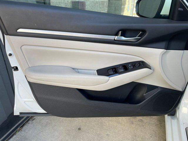 Photo of 2024 Pearl White Tricoat Nissan Altima