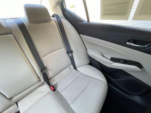 Photo of 2024 Pearl White Tricoat Nissan Altima
