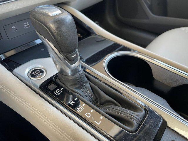 Photo of 2024 Pearl White Tricoat Nissan Altima