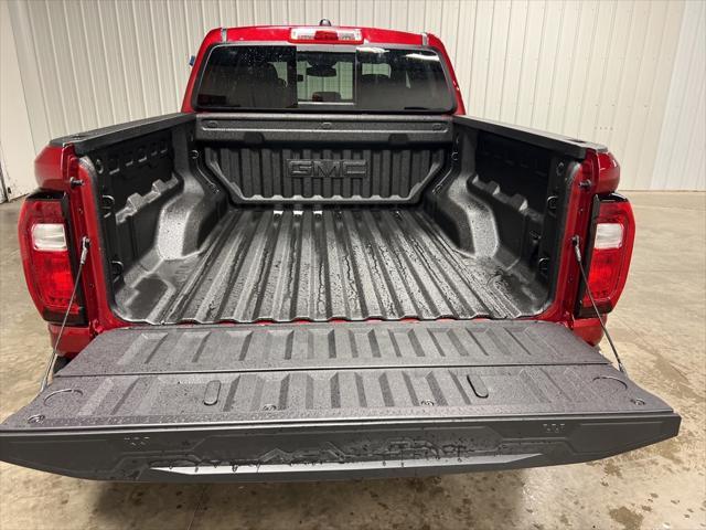 Photo of 2025 Volcanic Red Tintcoat GMC Canyon