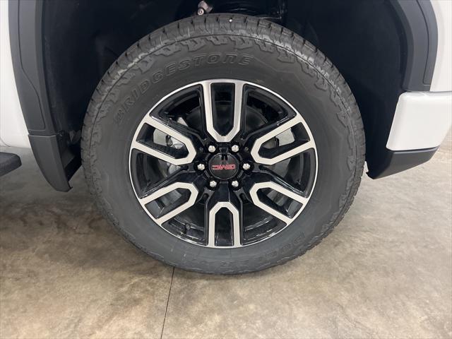 Photo of 2025 SUMMIT  WHITE GMC Sierra 1500