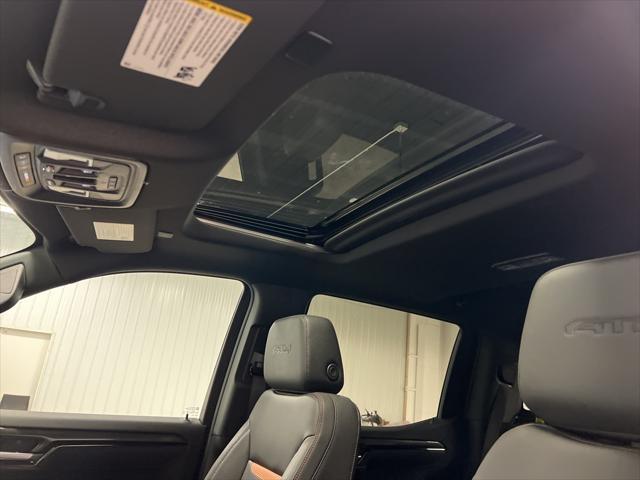 Photo of 2025 SUMMIT  WHITE GMC Sierra 1500
